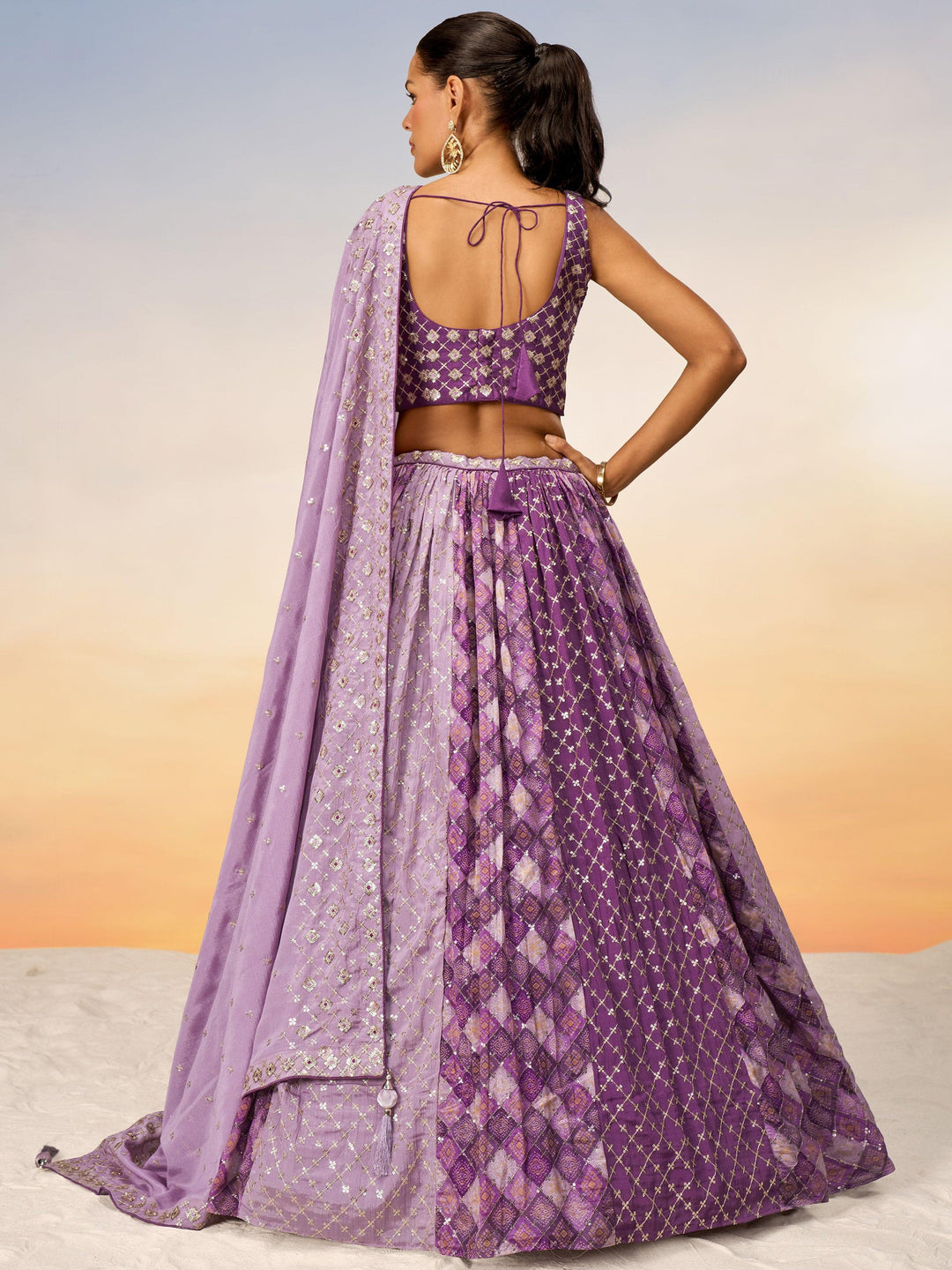 Tantalizing Purple Sequins Chiffon Sangeet Wear Lehenga Choli