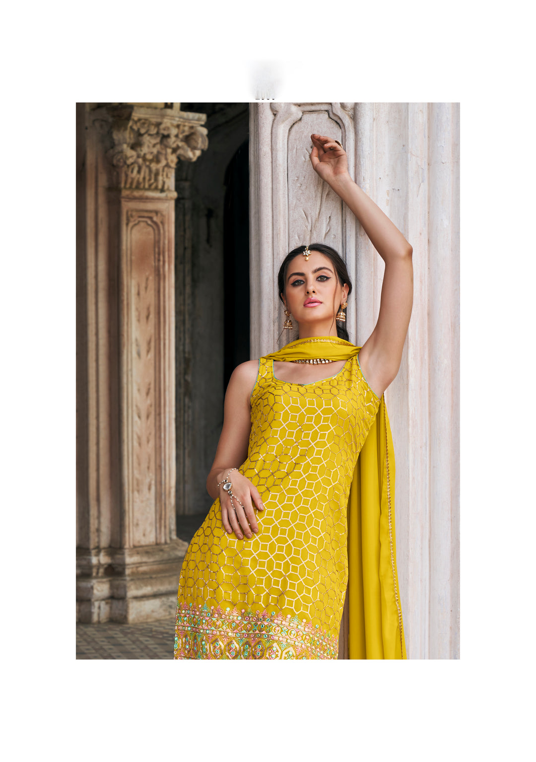 Elegant Faux Georgette Sharara Set with Intricate Embroidery and Flared Pants