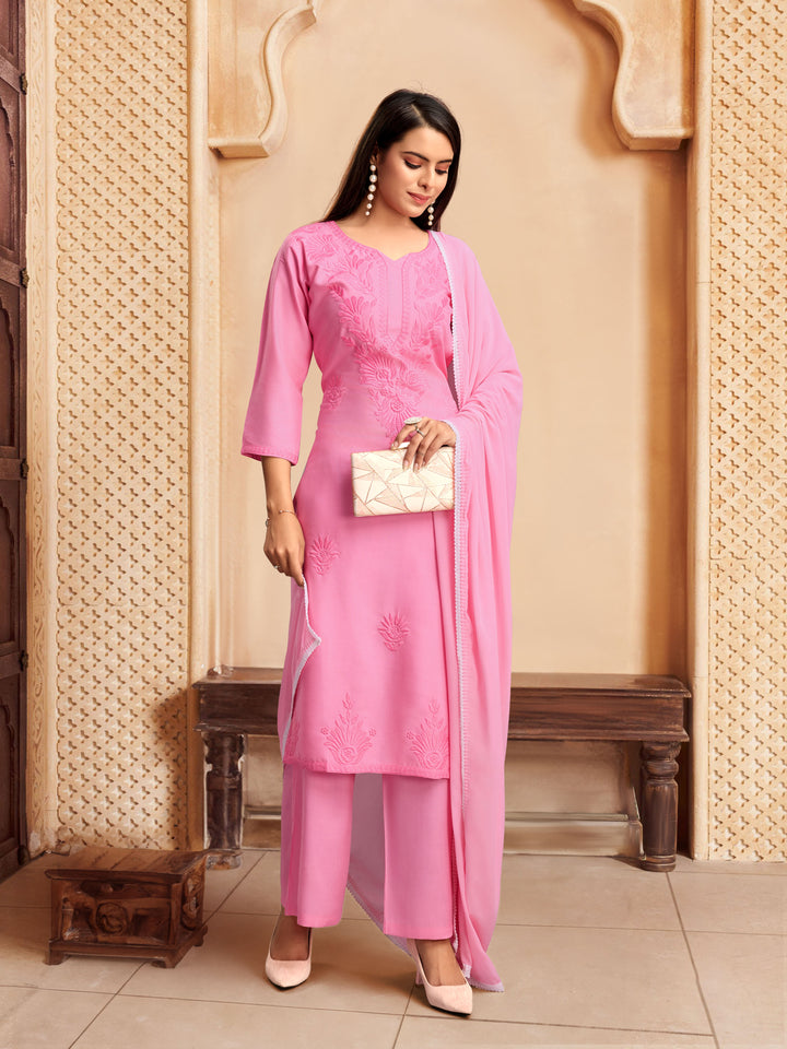 Elegant Rayon Salwar Kameez with Intricate Embroidery and Matching Dupatta