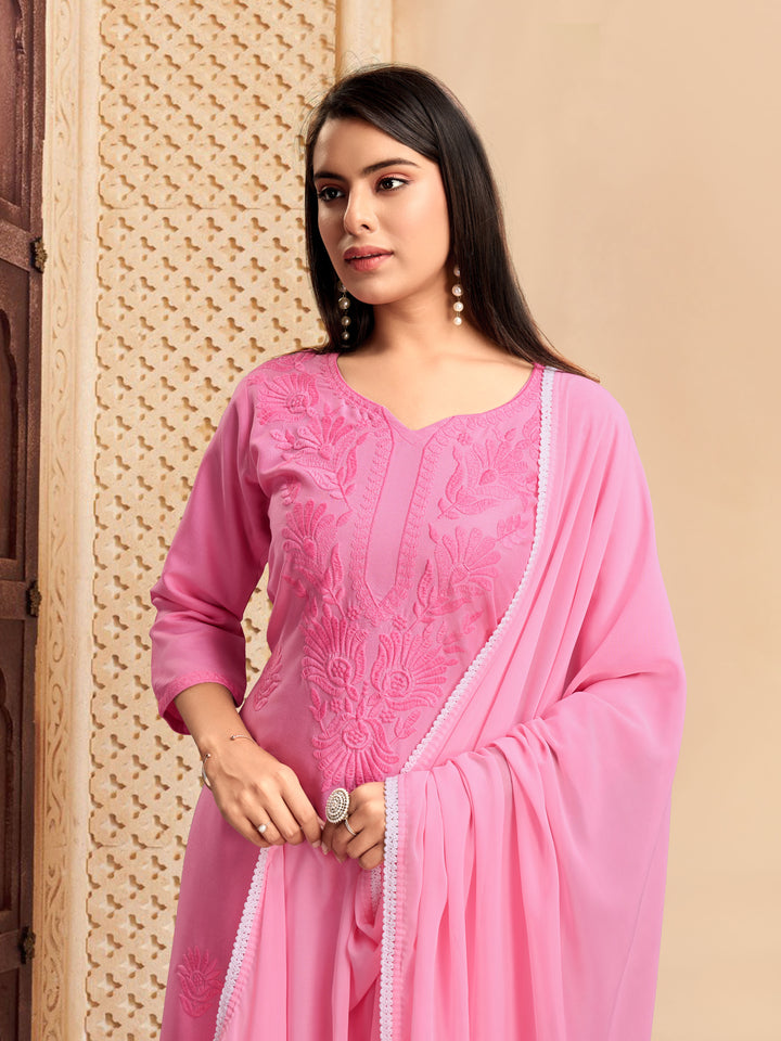 Elegant Rayon Salwar Kameez with Intricate Embroidery and Matching Dupatta