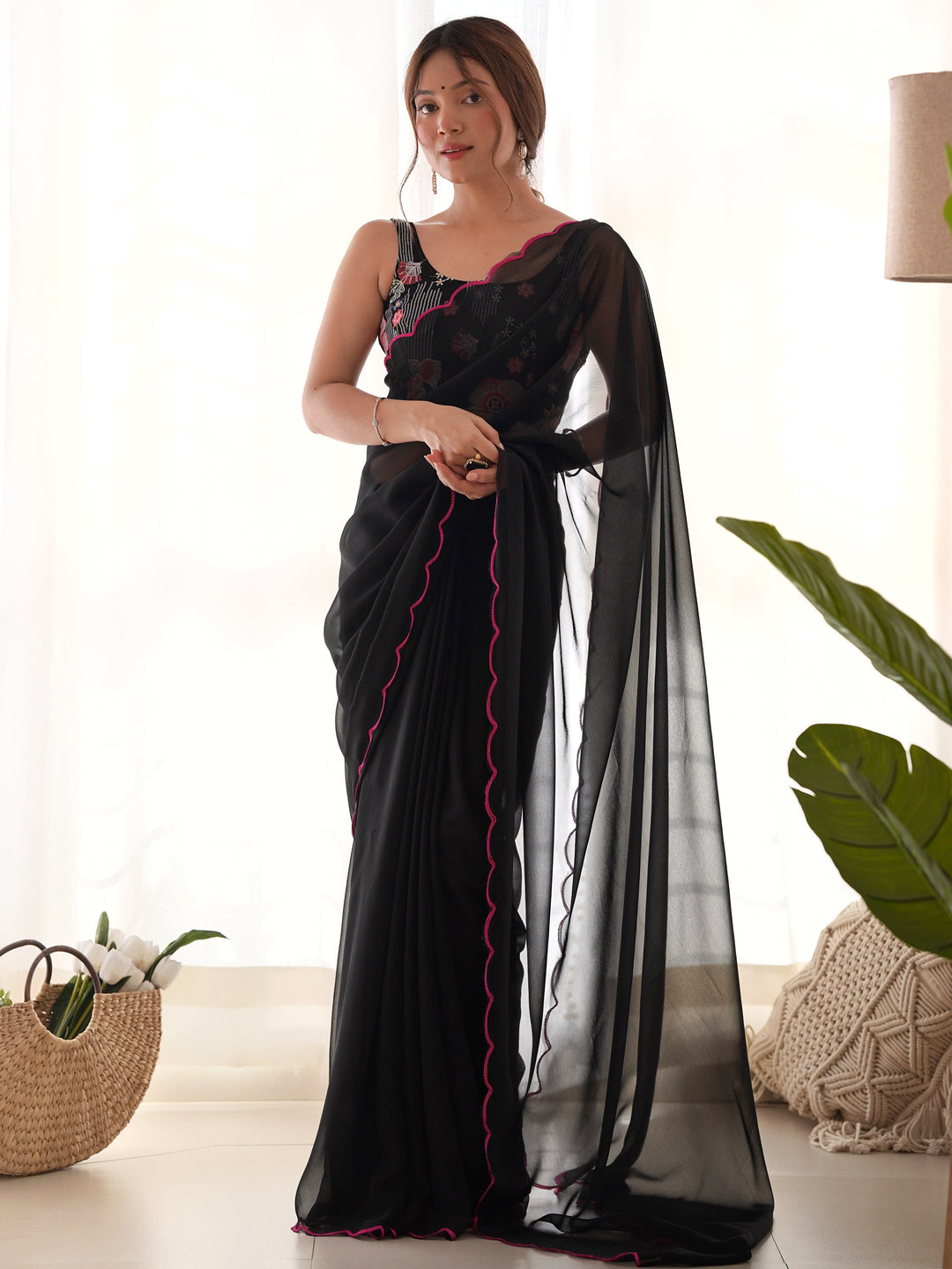 Black georgette saree crafted for elegance and style.