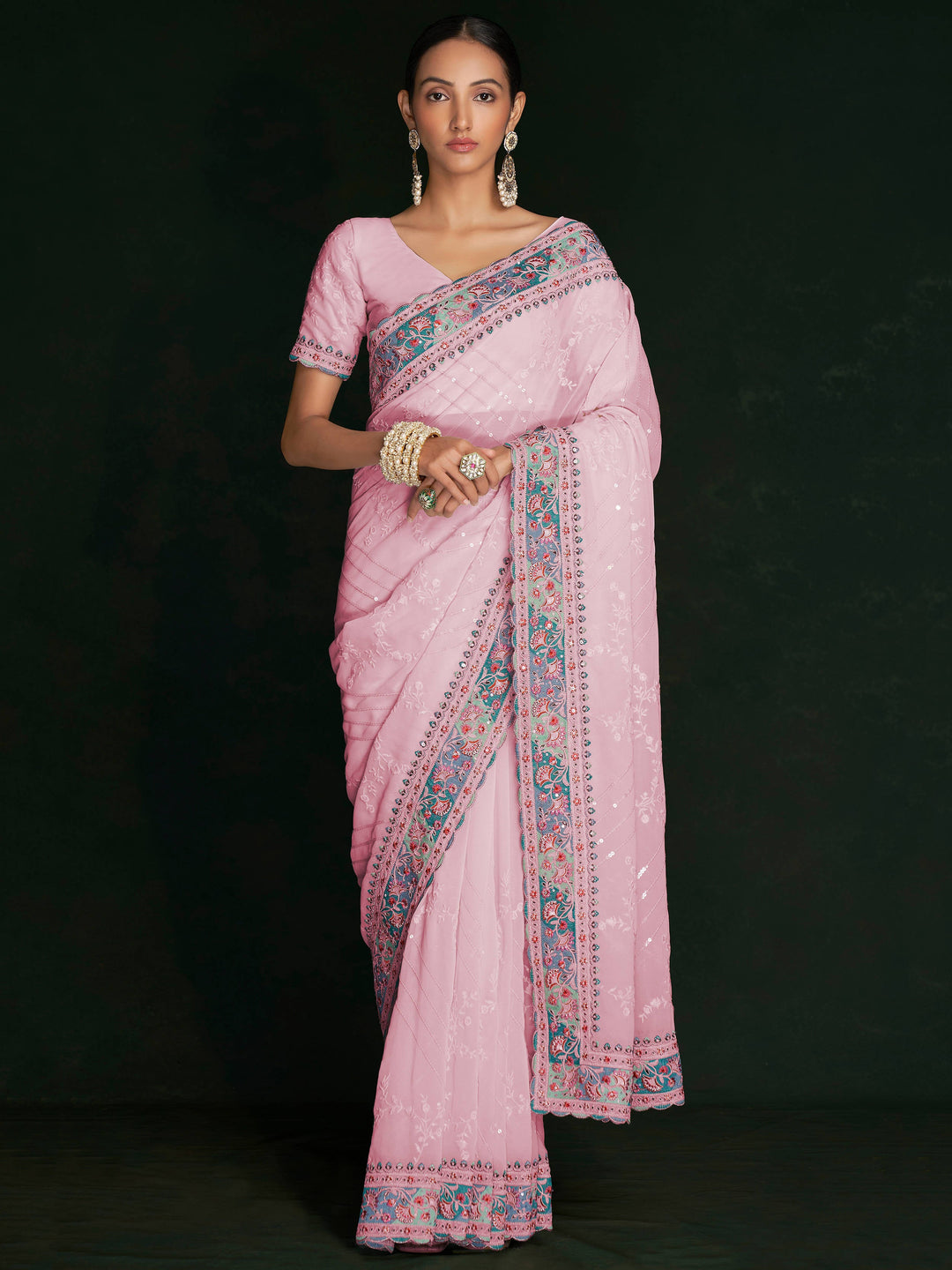 Pink georgette saree crafted for elegance and style.