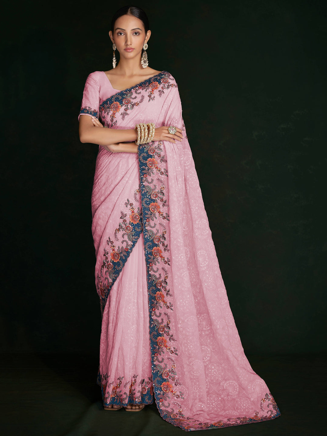 Pink georgette saree crafted for elegance and style.