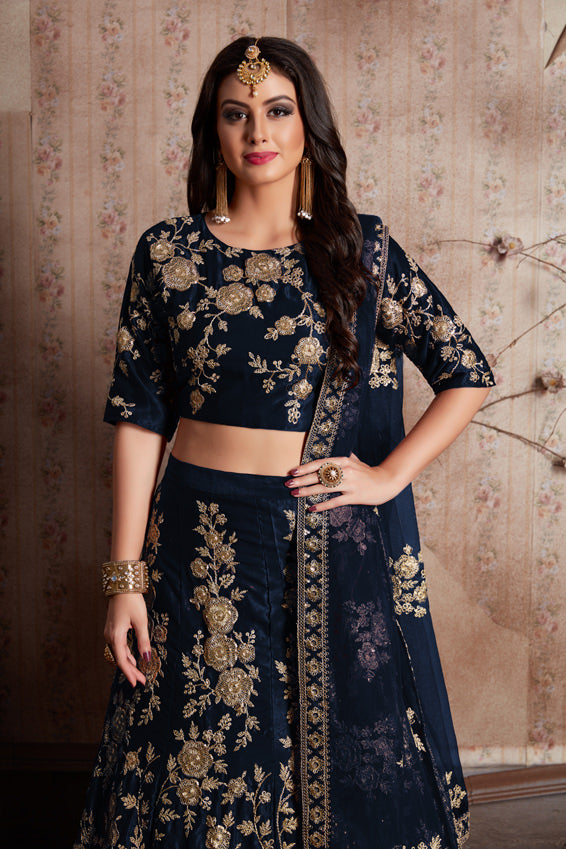 Velvet Lehenga Choli with Zari Embroidery, Crystals, and Net Dupatta