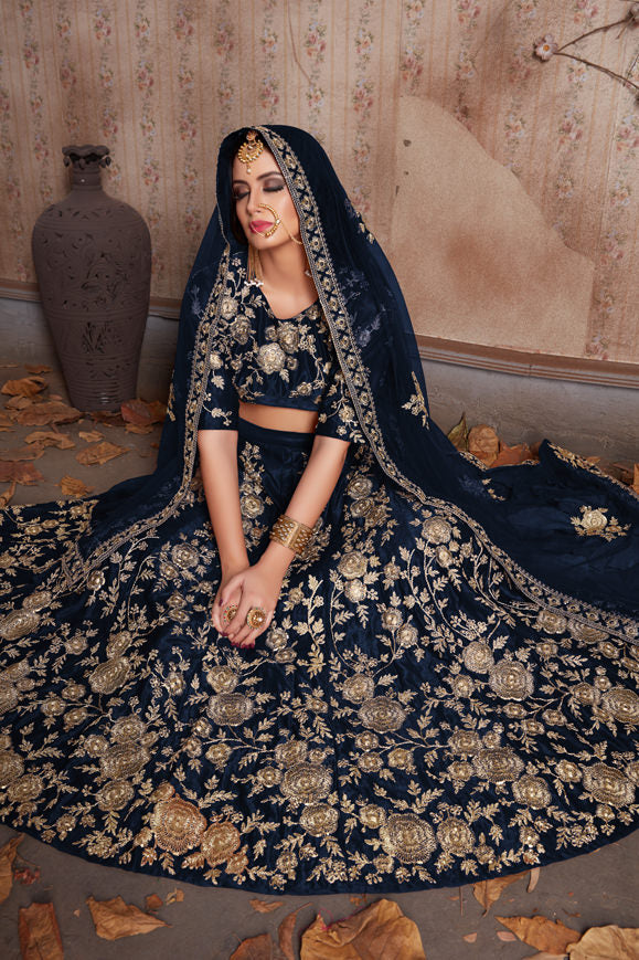 Velvet Lehenga Choli with Zari Embroidery, Crystals, and Net Dupatta