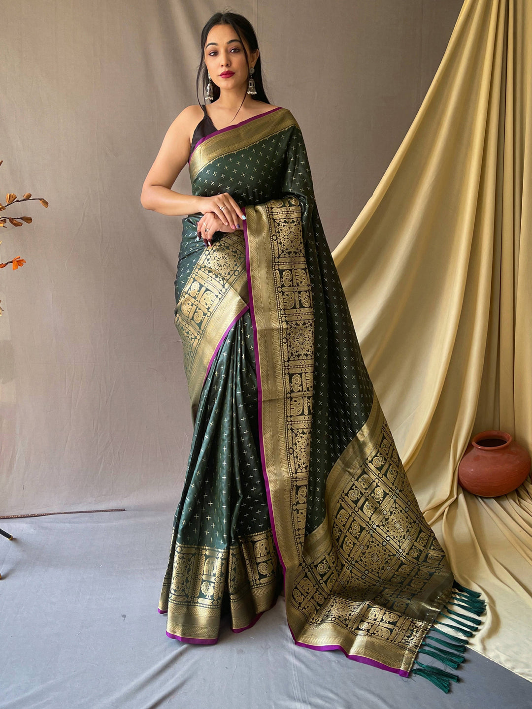 Green silk saree crafted for elegance and style.