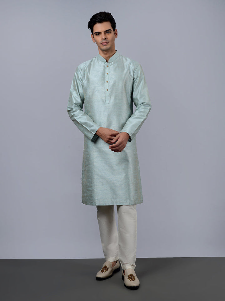 Silk blend light mint green kurta pajama set with delicate embroidery, perfect for USA events.