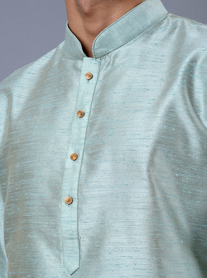 Embrace tradition with a contemporary twist in this chic dusty teal blue kurta set.