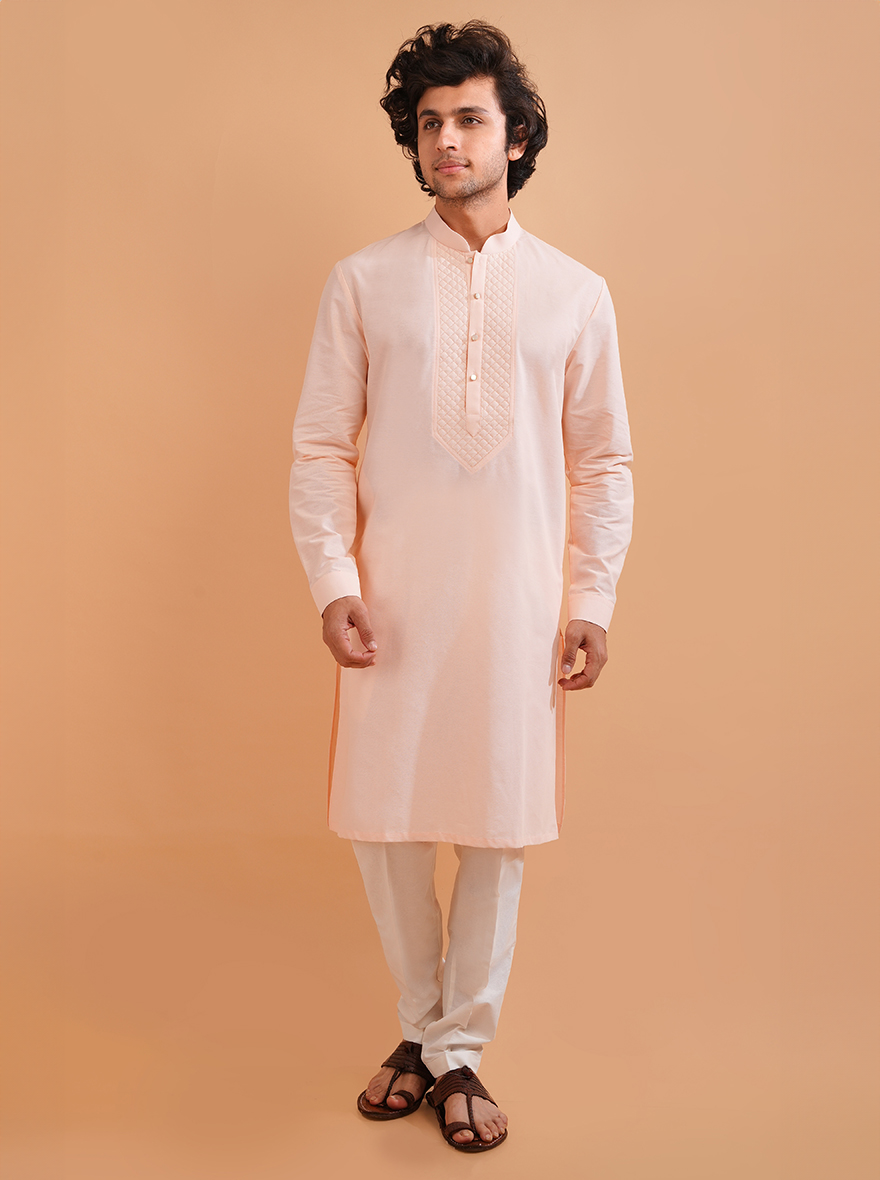 Stylish pink cotton blend kurta pajama for men, perfect for weddings and traditional wear.