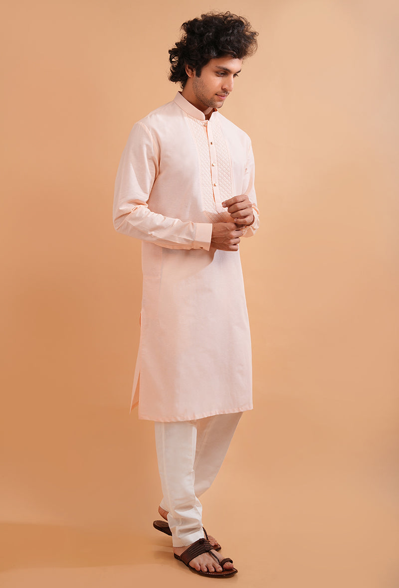 Semi-casual pink kurta pajama for USA men, blending tradition with luxury.