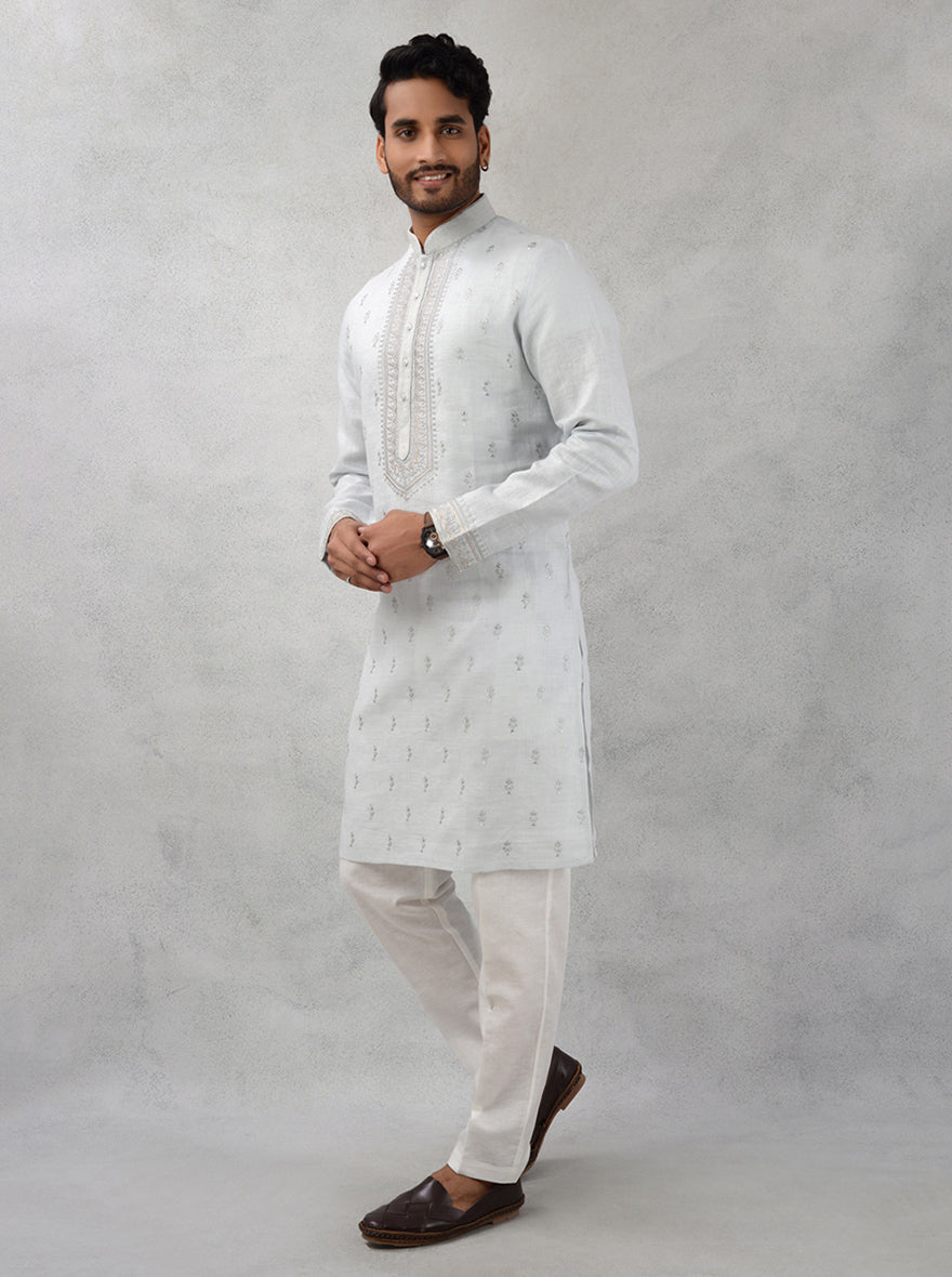 Designer light grey kurta for stylish men during cultural celebrations.