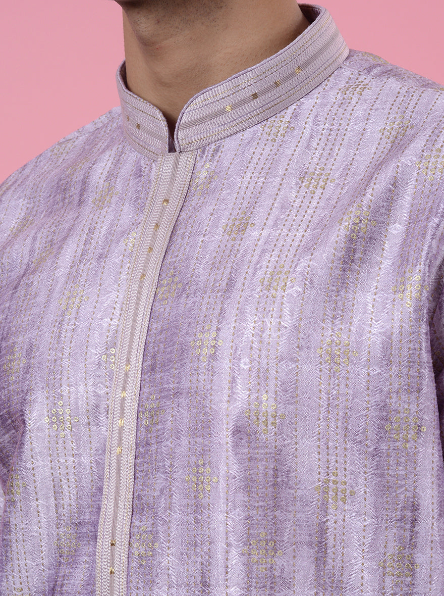 Perfect for festive events, this Lavender Kurta Pajama adds a touch of luxury to your look.