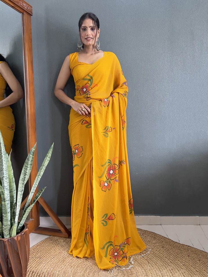 Yellow georgette saree crafted for elegance and style.