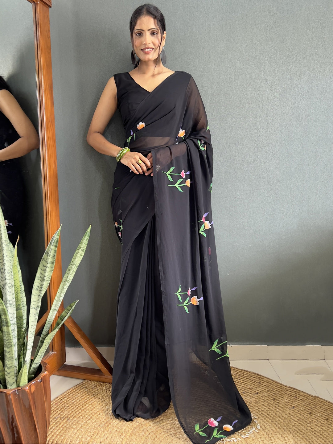 Black georgette saree crafted for elegance and style.