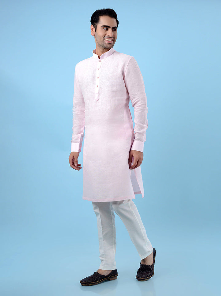 Comfortable solid pink kurta pajama for USA men’s traditional gatherings.