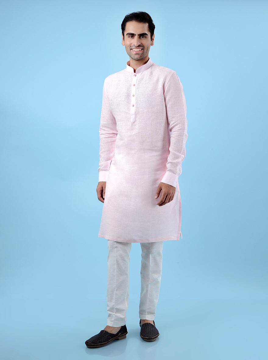 Soft pink linen kurta pajama for USA men, ideal for comfortable gatherings.