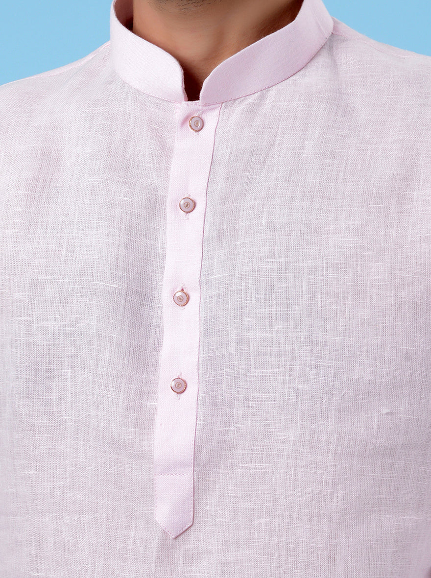 Casual and stylish pink linen kurta pajama set for men, perfect for cultural and ethnic occasions.