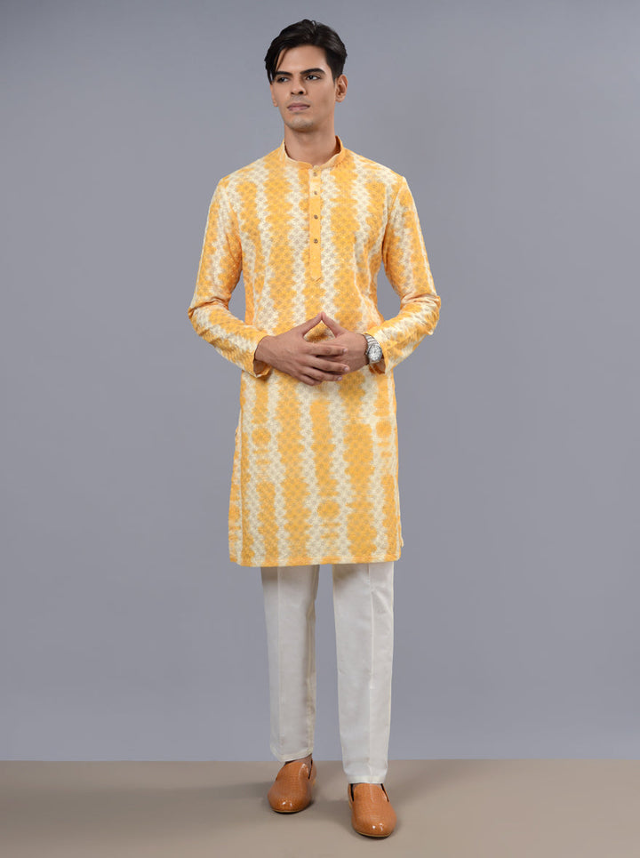 Comfortable yellow kurta pajama for men, ideal for adding flair to your wardrobe during Haldi celebrations in the USA.