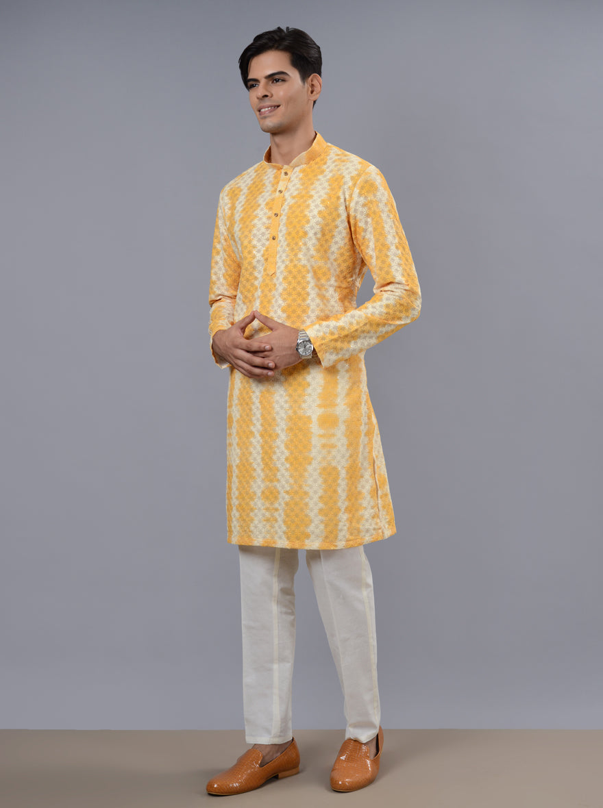 Chic yellow kurta pajama, crafted from luxurious silk blend, perfect for making a statement at stylish gatherings in the USA.