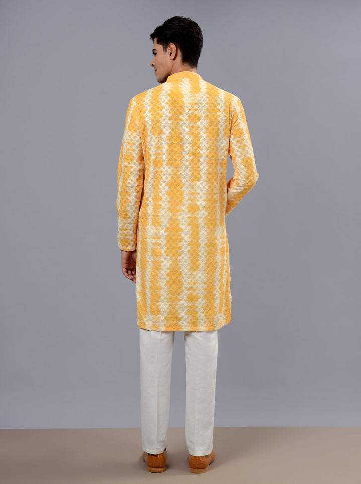 Unique yellow kurta pajama for men, designed with elegant prints, ensuring comfort and style for Haldi events in the USA.