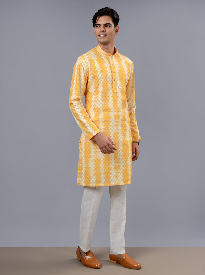 Timeless yellow kurta pajama for men in silk blend, perfect for enhancing your festive wardrobe for celebrations in the USA.