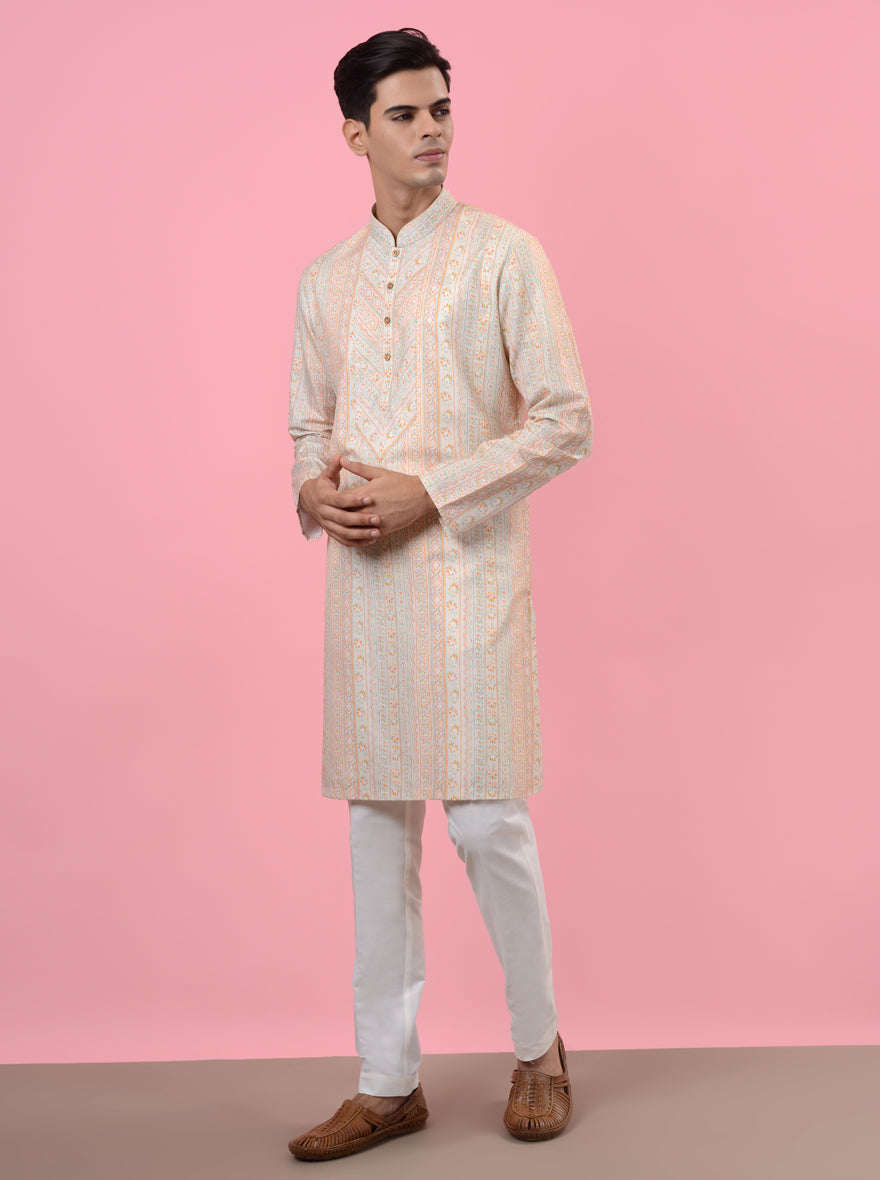 Chic cream kurta pajama in silk blend, ideal for men celebrating haldi and mehndi events with sophistication in the USA.