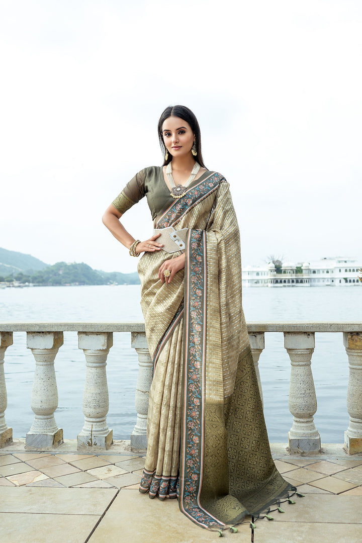 Festive silk saree with zari pallu and flower-printed border for celebrations