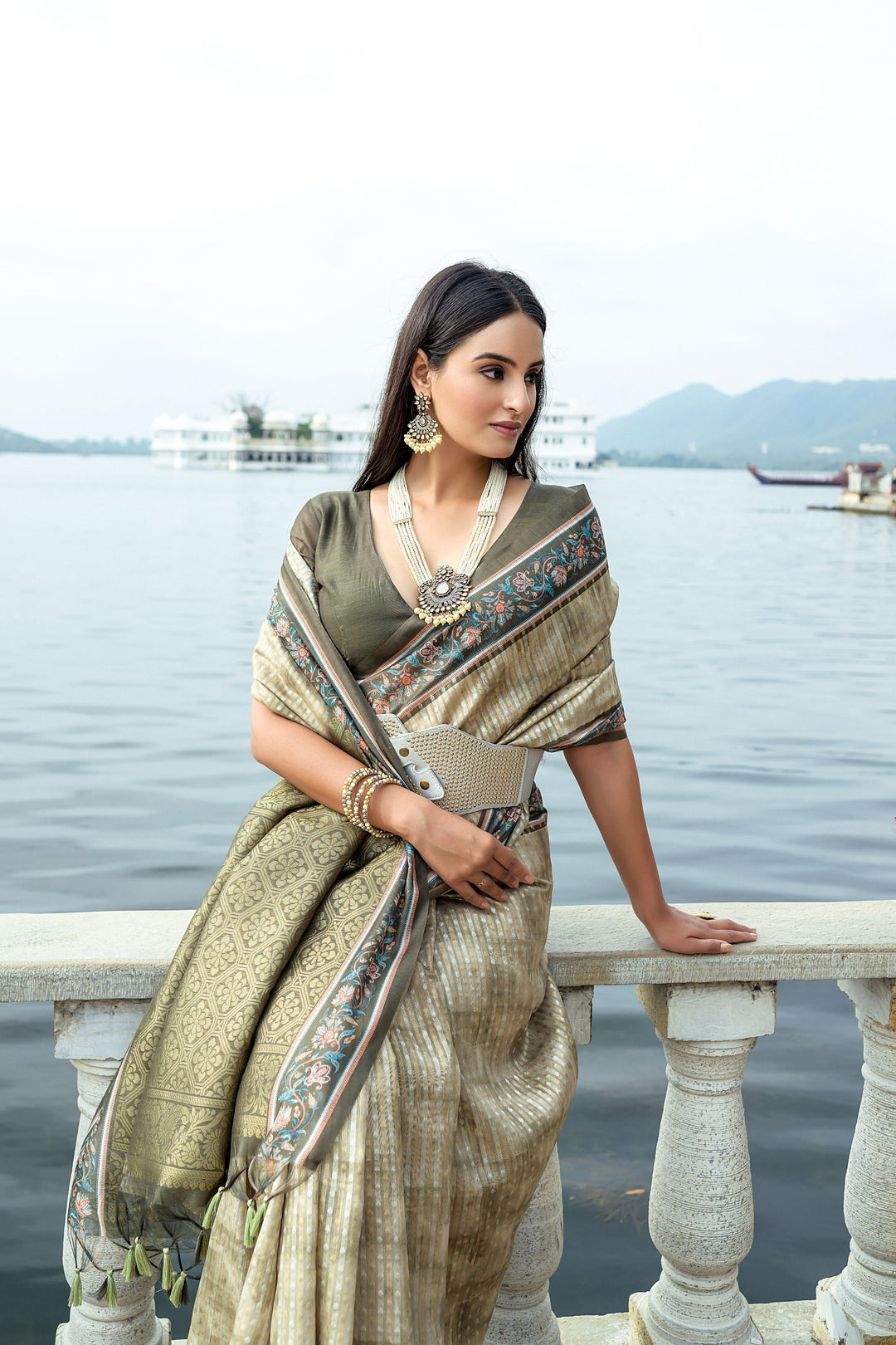 Soft silk saree with elegant zari weaving and floral contrast border