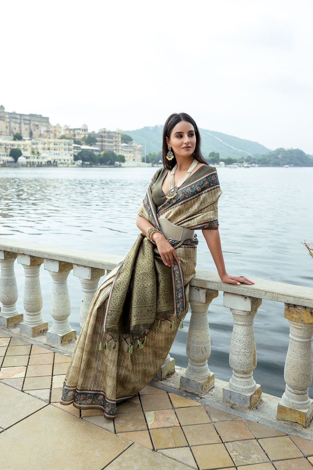 Luxurious silk saree with zari pallu and all-over zari weaving design