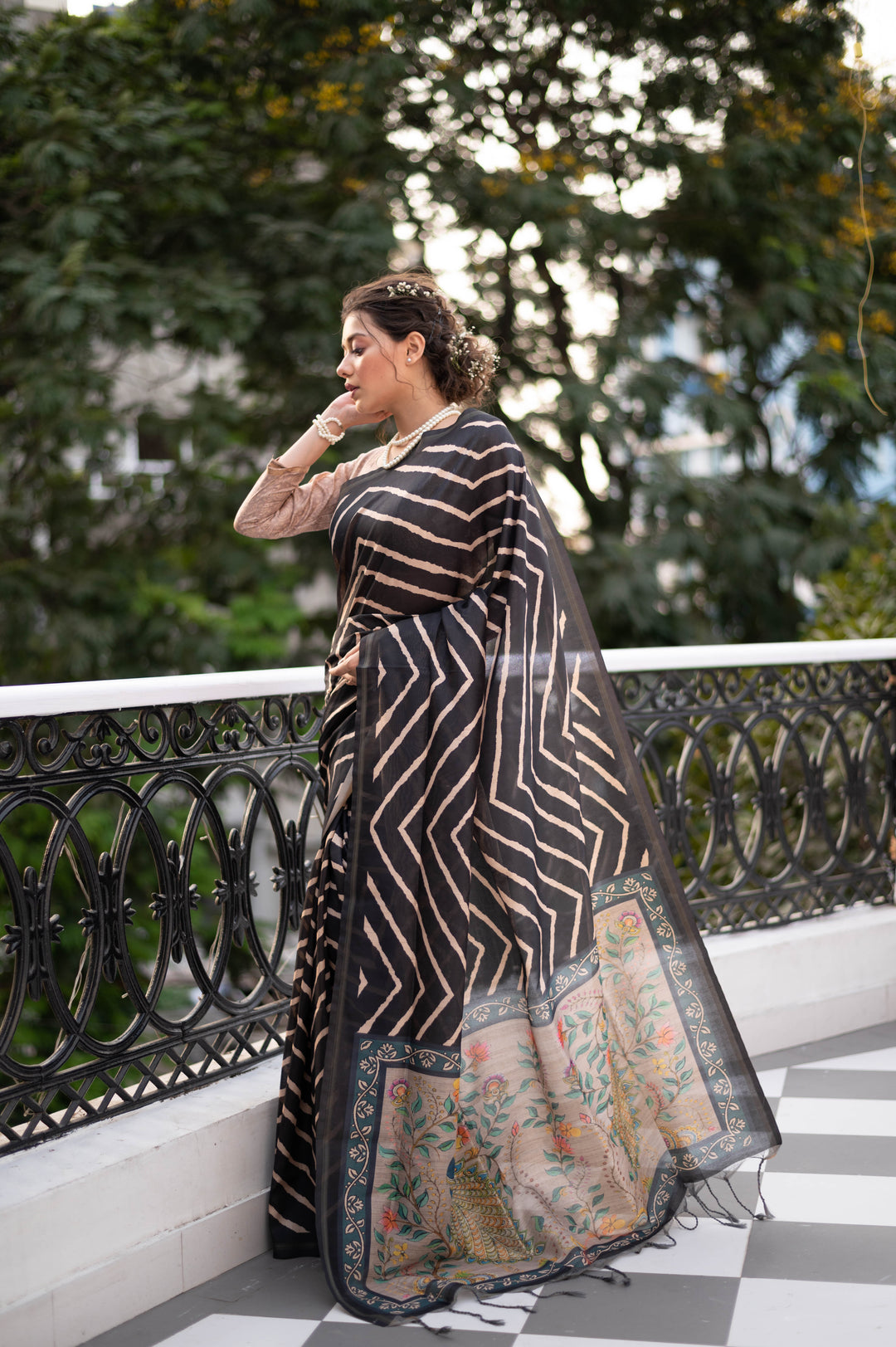 Elegant Tussar silk saree featuring Leriya print and zari border with tassels