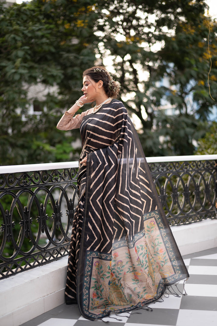 Elegant Tussar silk saree featuring Leriya print and zari border with tassels