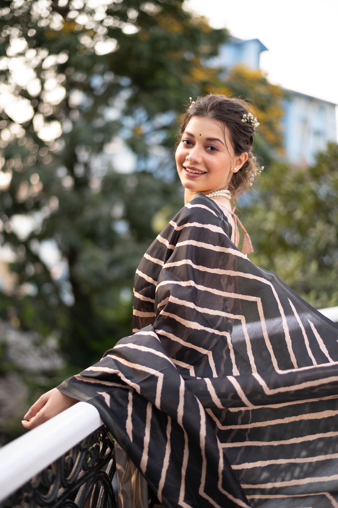 Tussar silk saree with Kalamkari-style pallu and intricate zari border