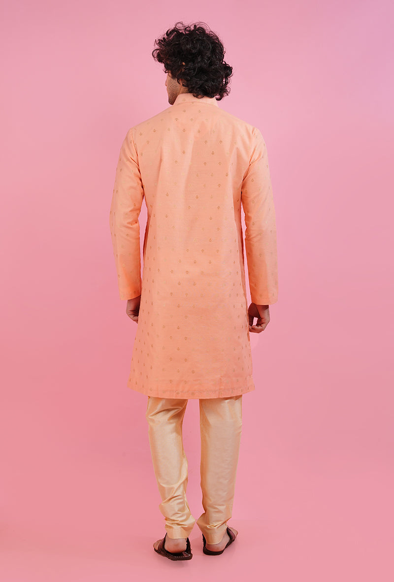 Premium coral peach kurta pajama set for men, crafted from silk jacquard for a refined look.