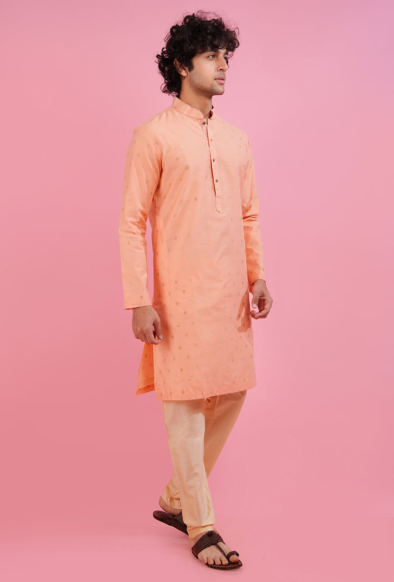 Men’s coral peach silk jacquard kurta pajama, offering a traditional and elegant design.