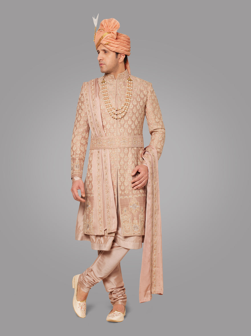 Perfect for special occasions, this raw silk sherwani blends modern style with classic elegance.