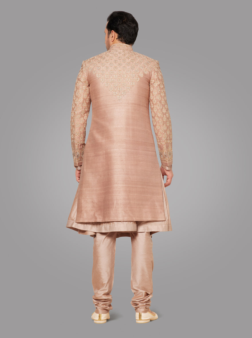 Elevate your wedding attire with this beautifully crafted beige sherwani, ideal for a refined appearance.