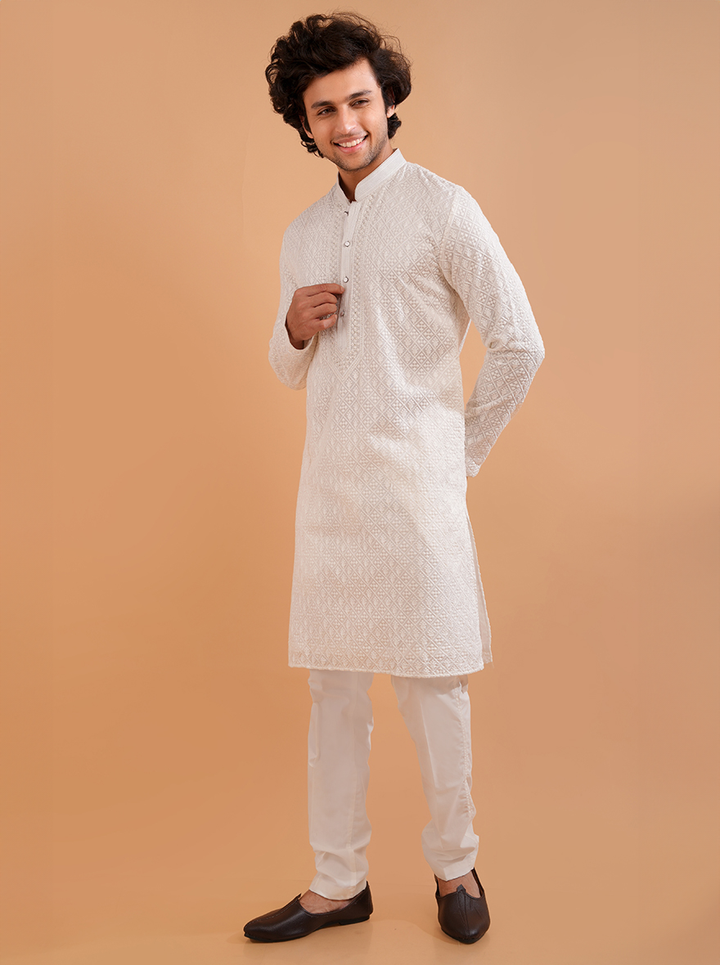 USA-targeted white kurta with intricate embroidery, ideal for haldi events.