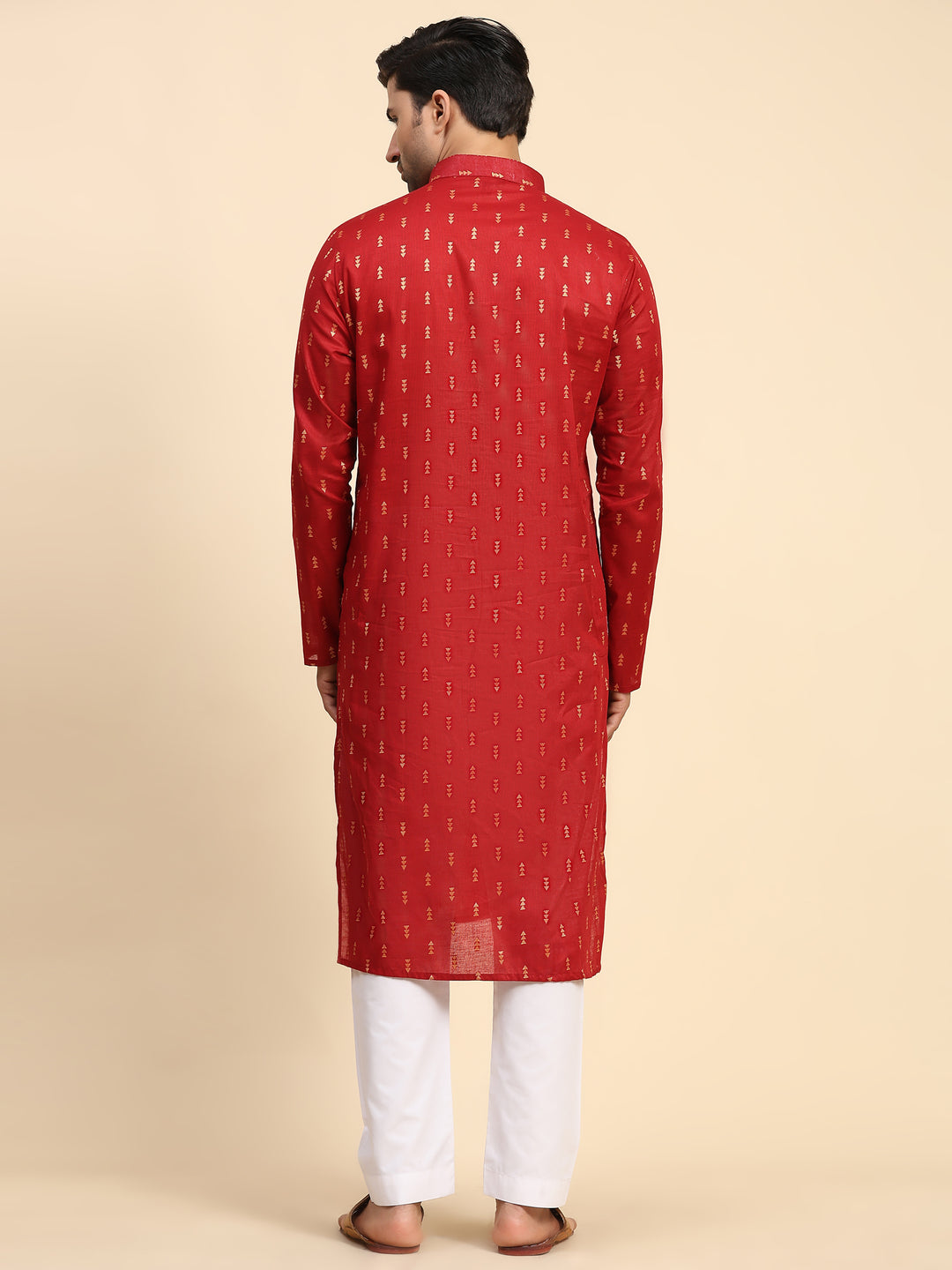 Men's traditional red kurta with intricate handwoven designs by Rawayi.