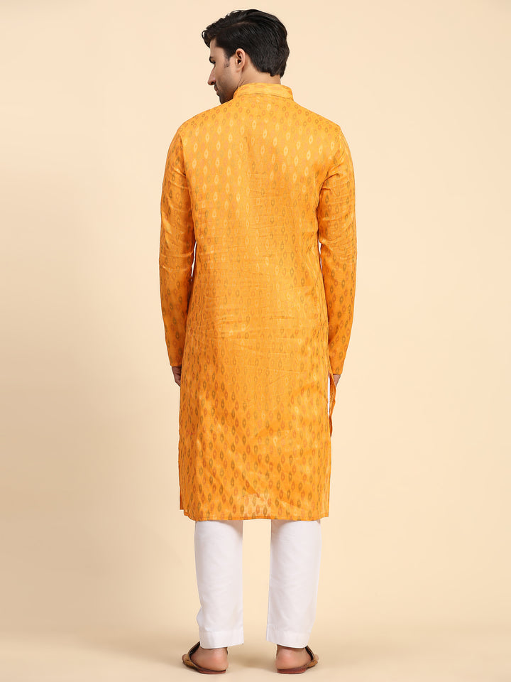 Luxurious light orange kurta set for men made from pure cotton fabric.