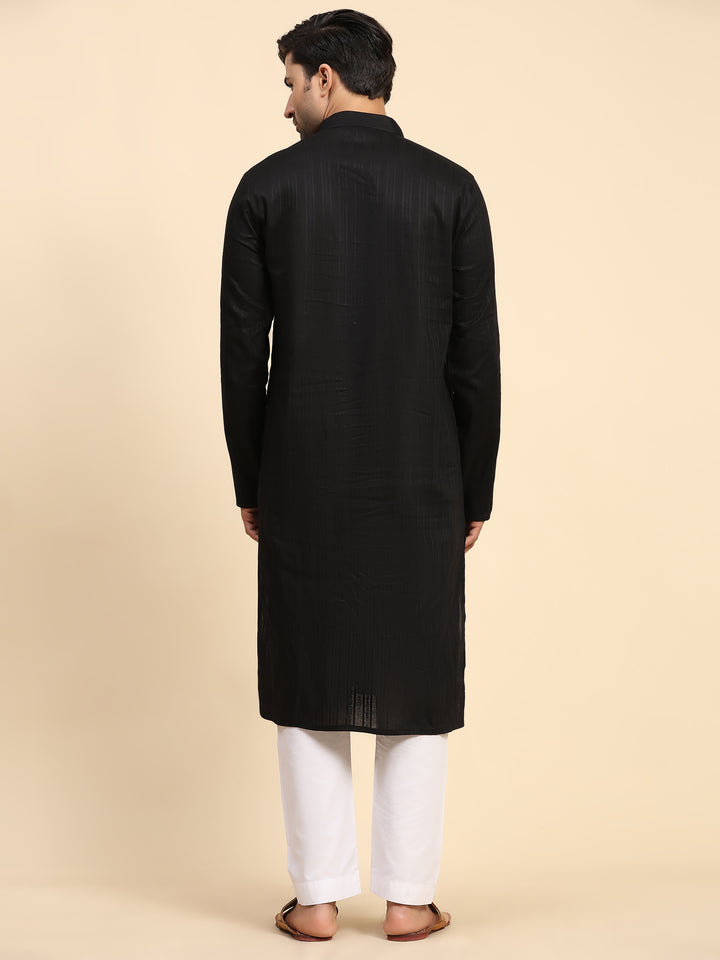 Traditional black kurta pajama for men featuring intricate handwoven embroidery on pure cotton fabric, paired with an art silk pajama.