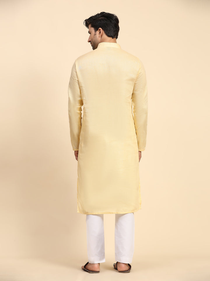 Stylish creamish yellow kurta pajama set, ideal for traditional events and festive celebrations.