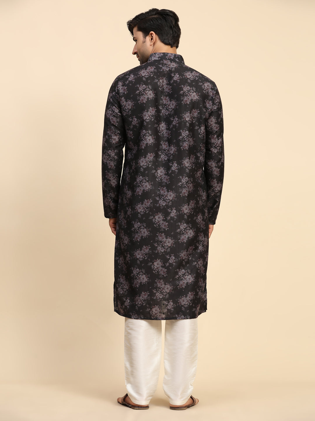 Men's black kurta pajama set with Midnight Blossom floral design, ideal for Sangeet and celebrations.