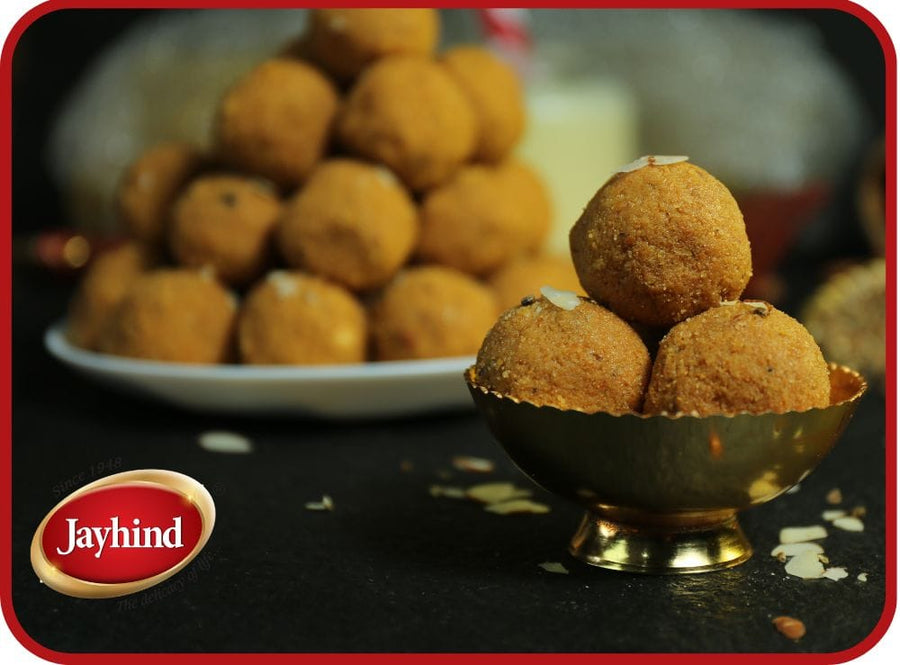 Besan Laddu  Rich and nutty Indian mithai made with roasted gram flour and ghee, ideal for festive occasions and gifting.