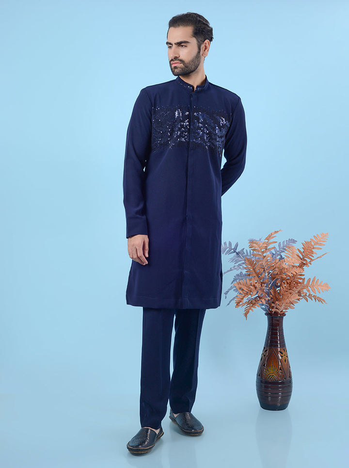 Men's blue sun silk kurta pajama set, featuring intricate embroidery for festive and traditional wear.