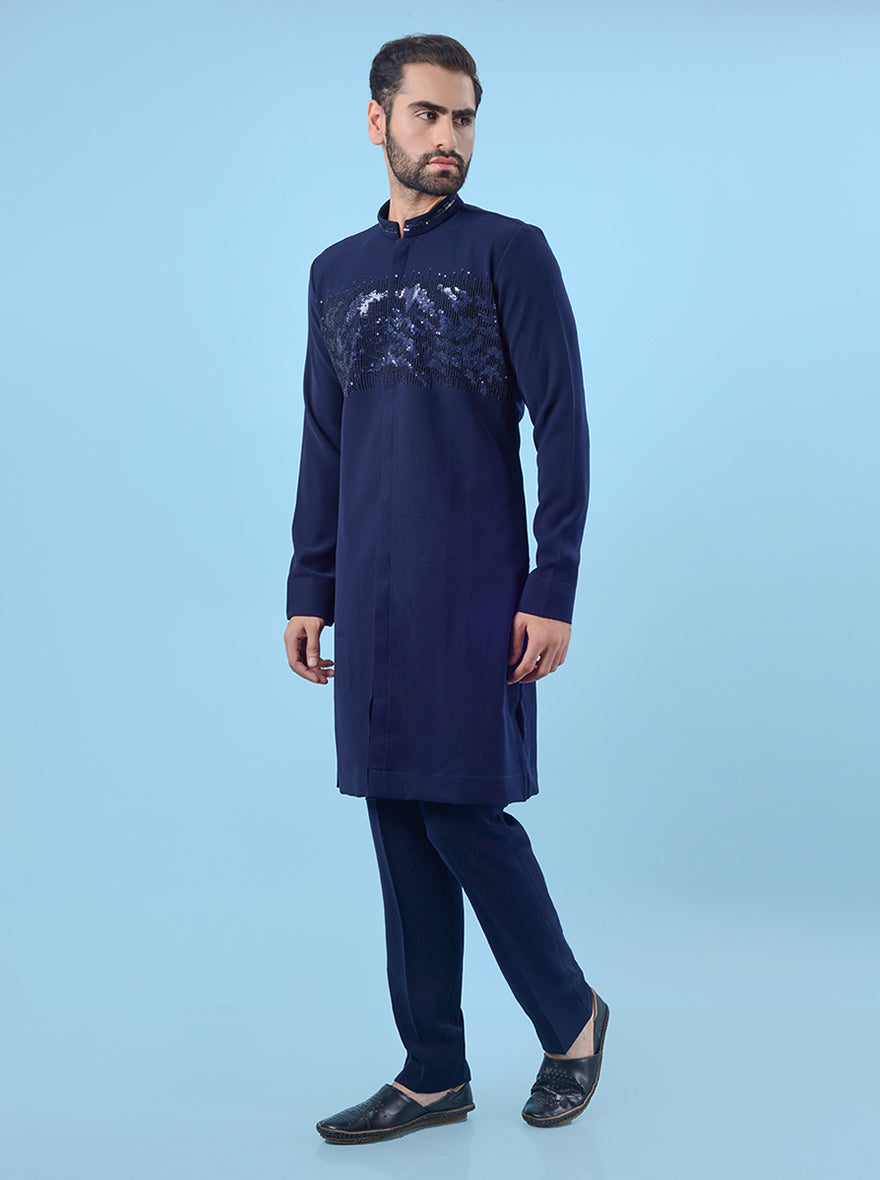 Stylish blue sun silk kurta pajama for men, designed with embroidered details for cultural celebrations.