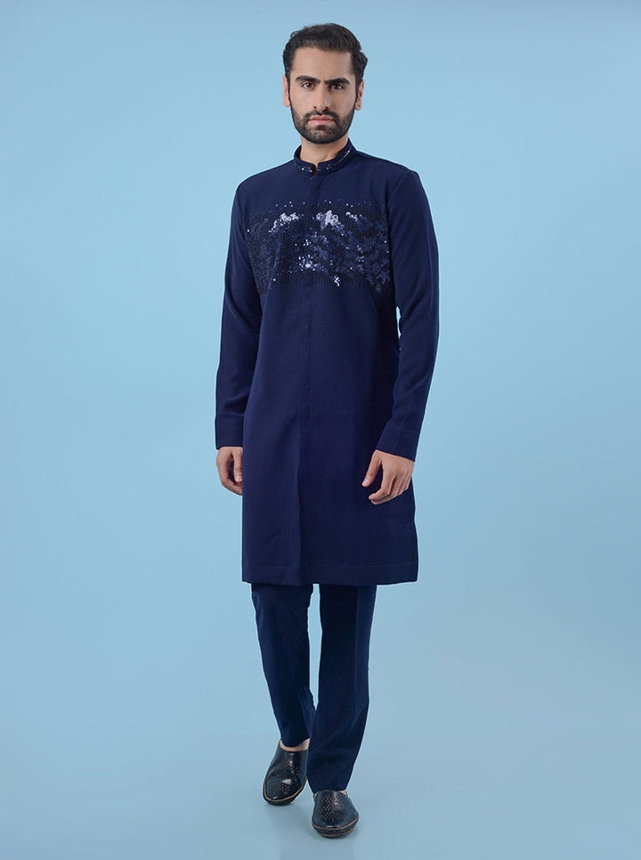 Men's blue kurta pajama set in sun silk, designed with intricate embroidery for a premium ethnic look.