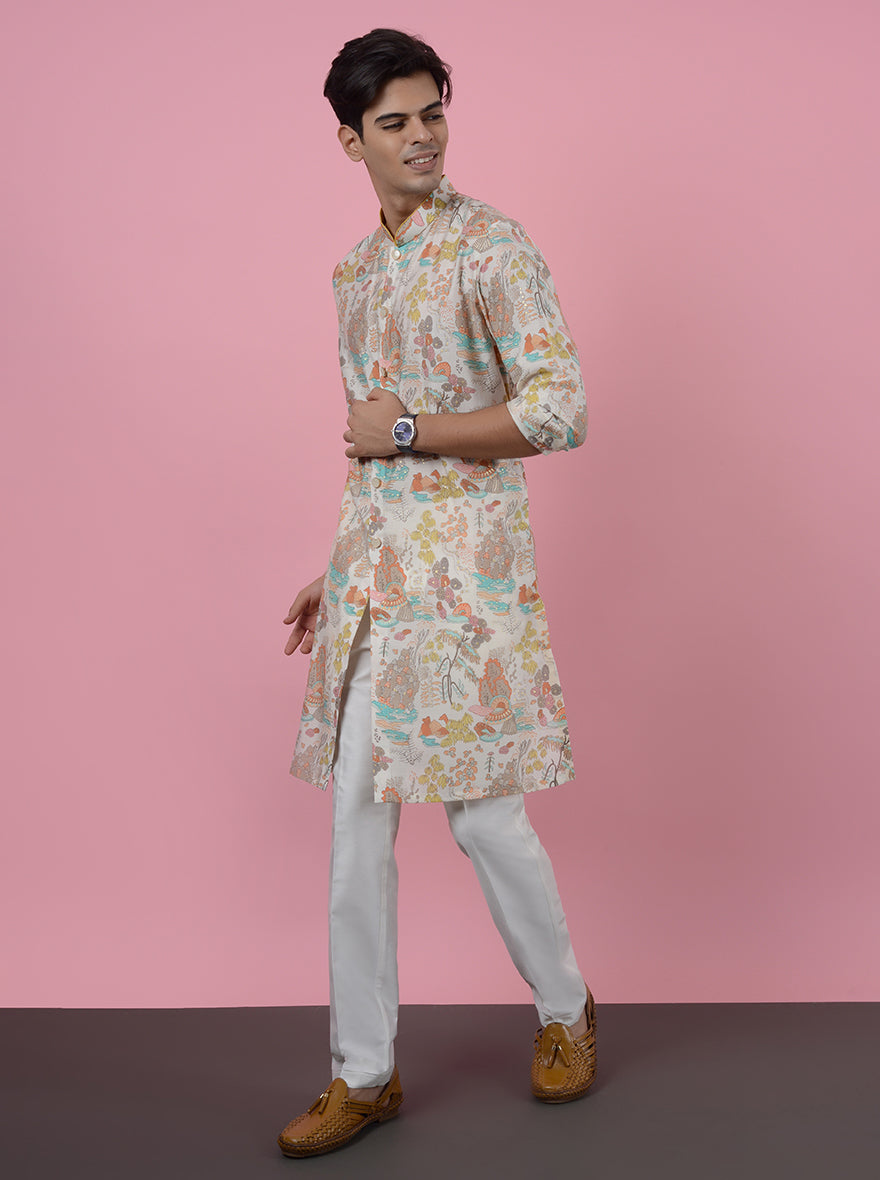 Step into elegance with this chic Cream Kurta Pajama tailored for modern celebrations.