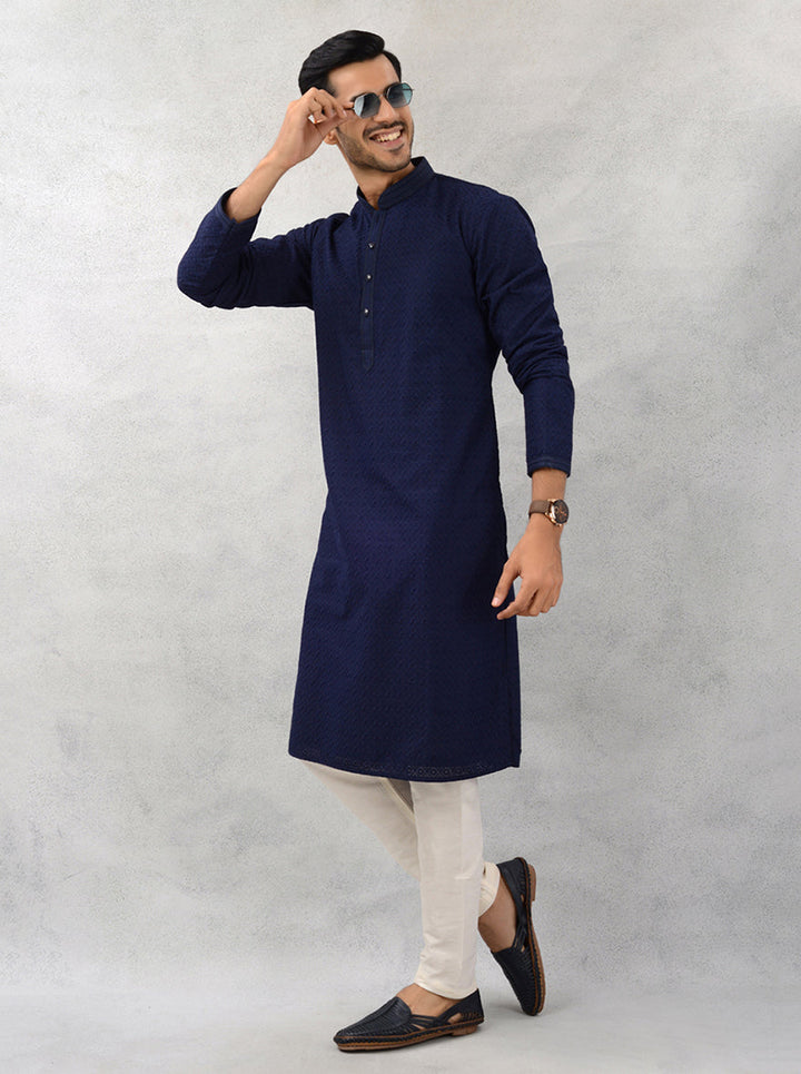 Luxurious navy kurta set ideal for festive occasions.