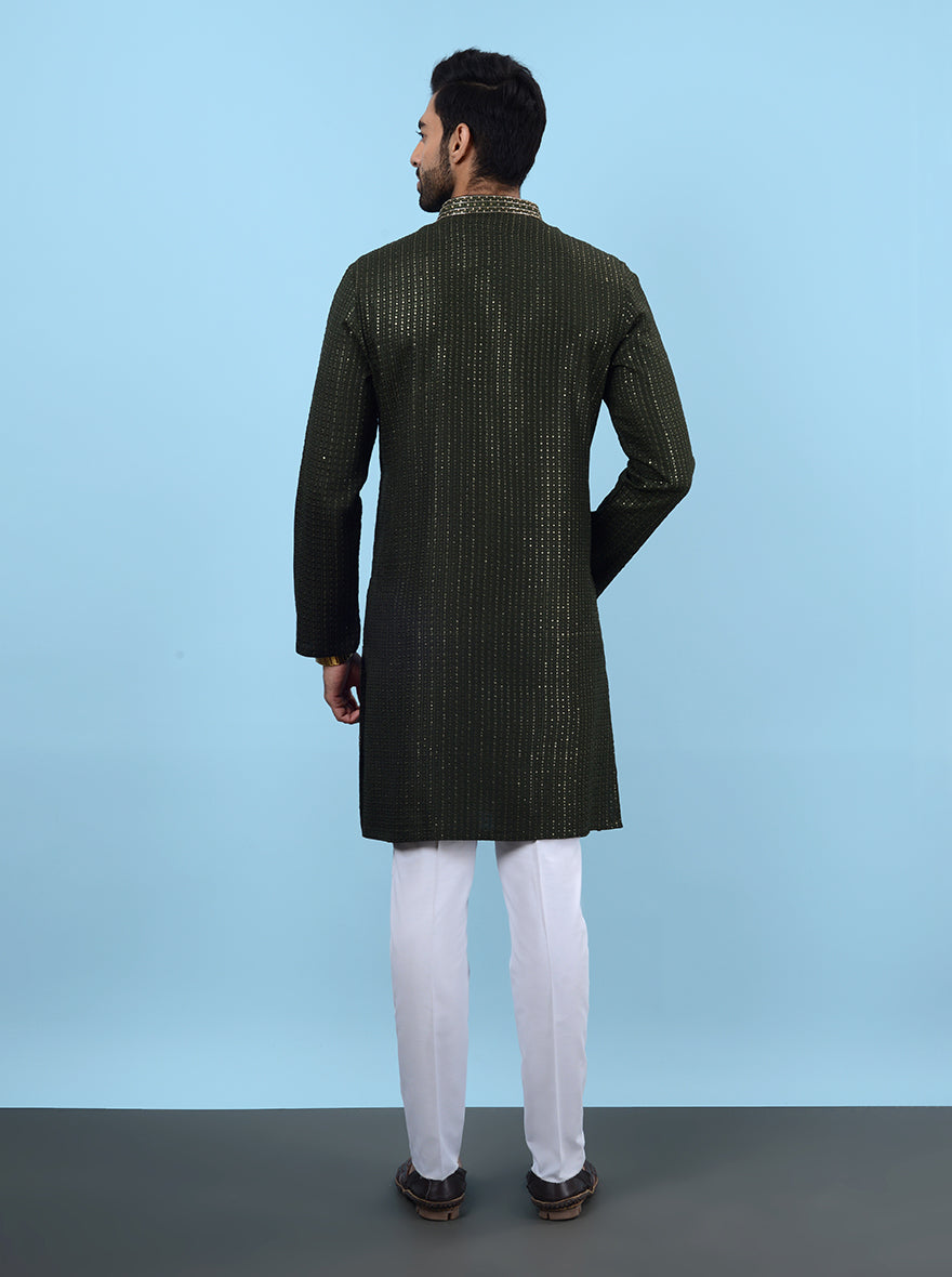 Unique embroidery makes this green kurta pajama a standout choice for celebrations.