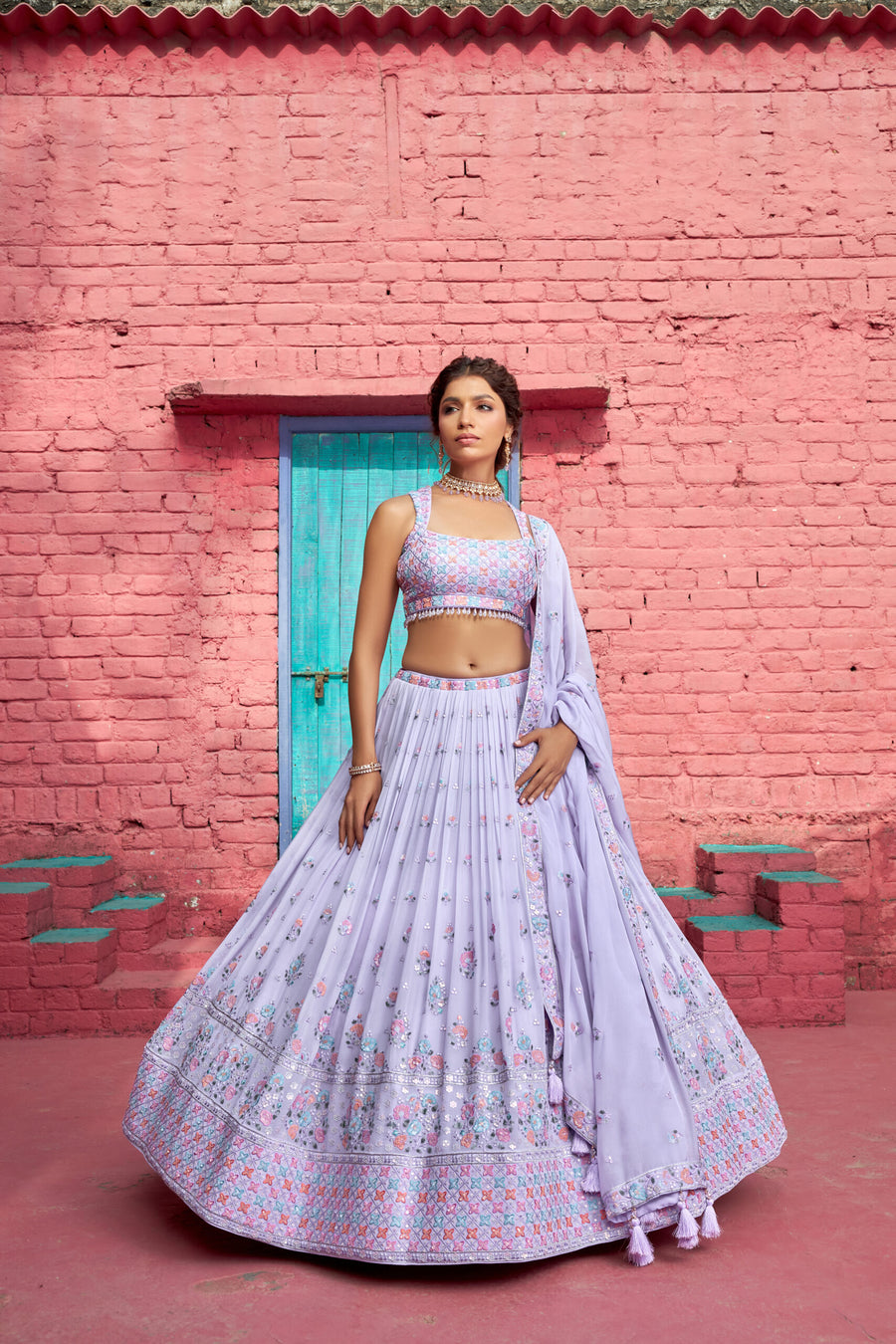 Stunning lilac lehenga choli made from chiffon, adorned with sequins for a touch of elegance and sparkle